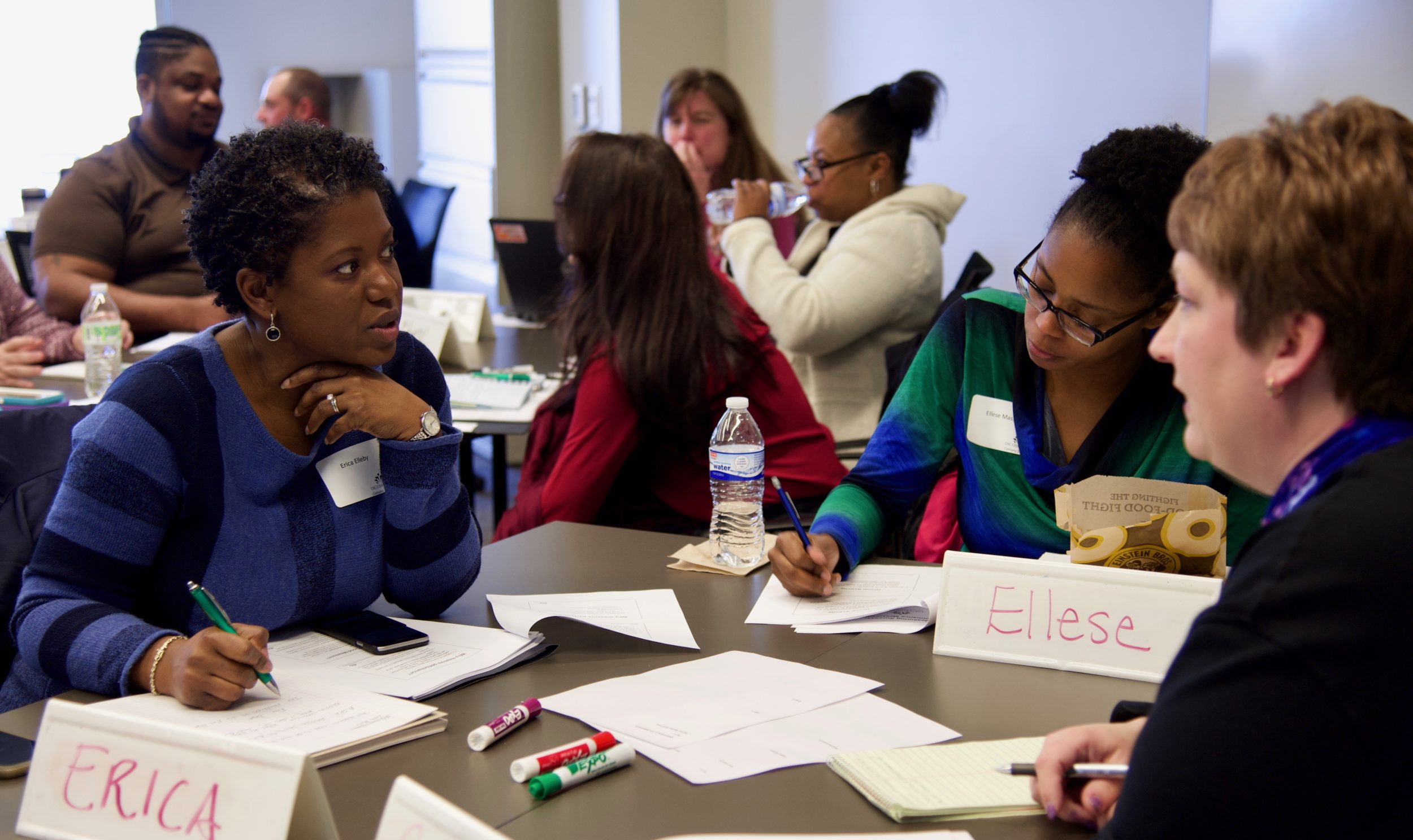 public management academy students working on a problem.