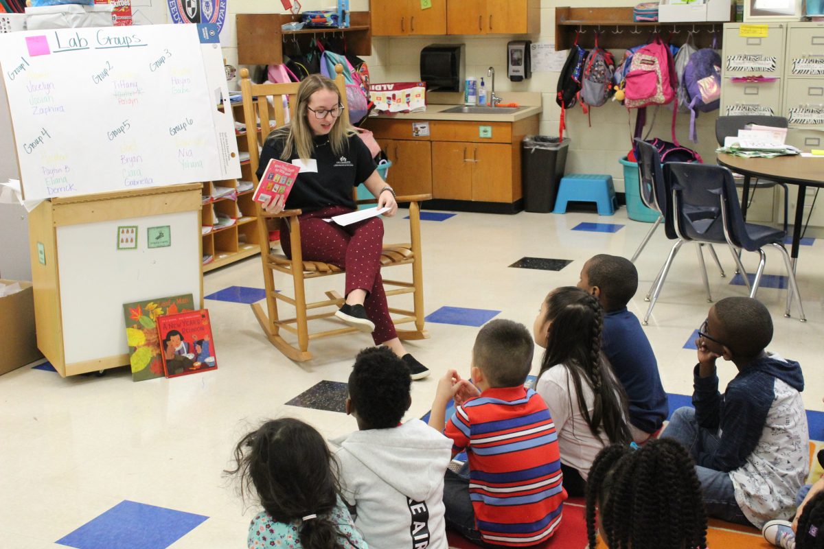 Teacher reading with students